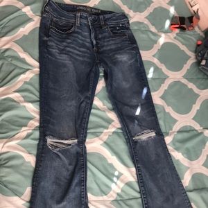 Jeans with holes at the knees
